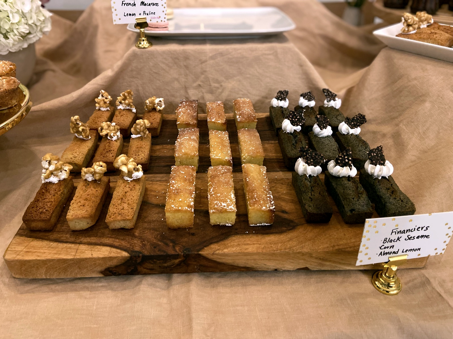 Rows of small dessert bites on a board